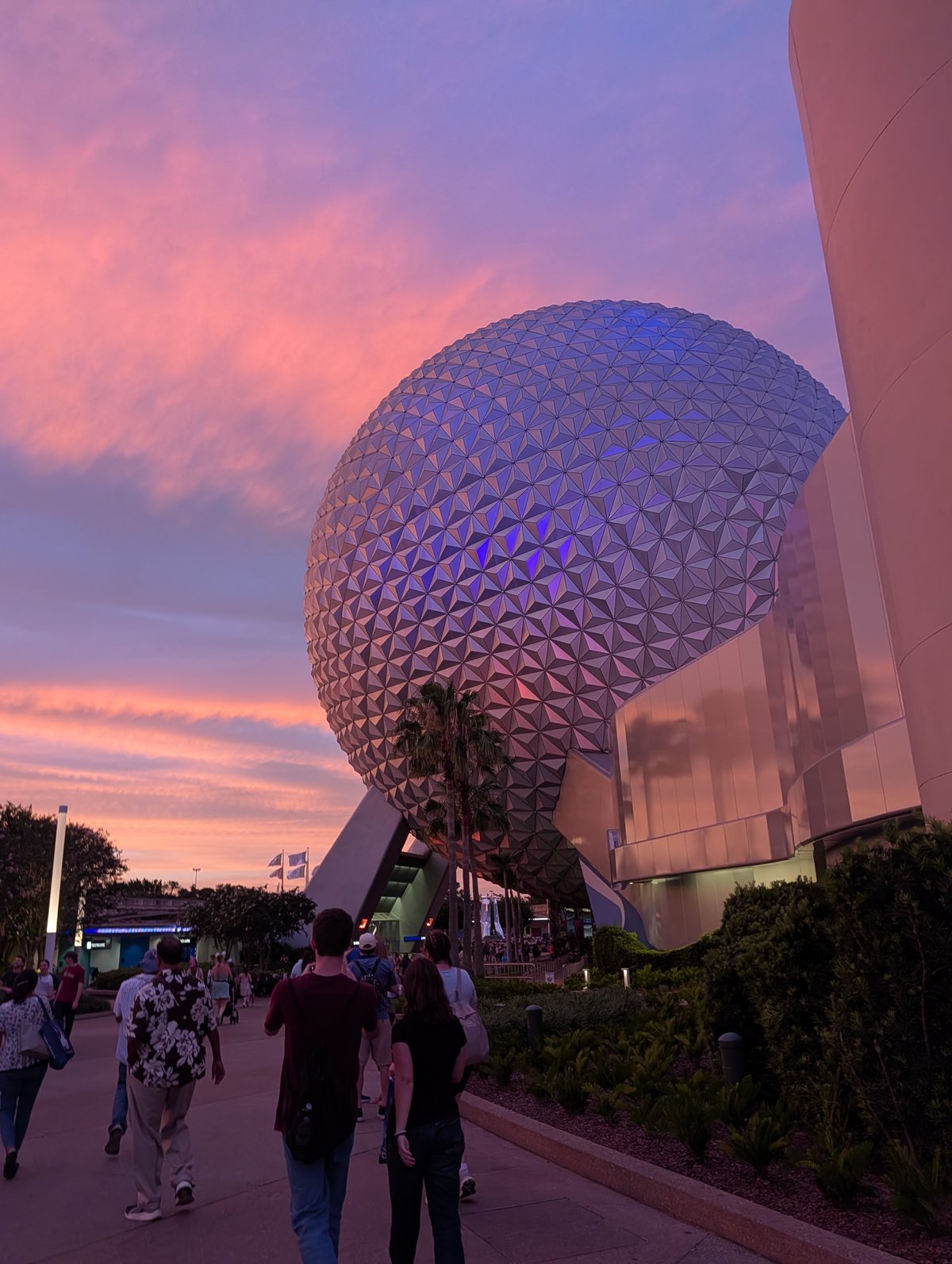 Epcot's Spaceship Earth glowing at sunset